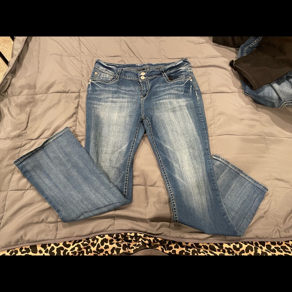 Distressed blue jeans